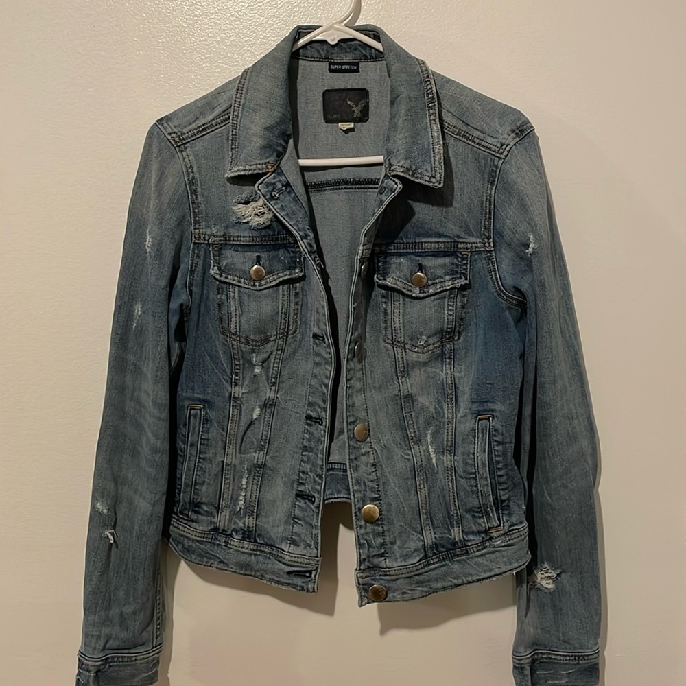 American Eagle denim distressed jacket. Color light denim size large.